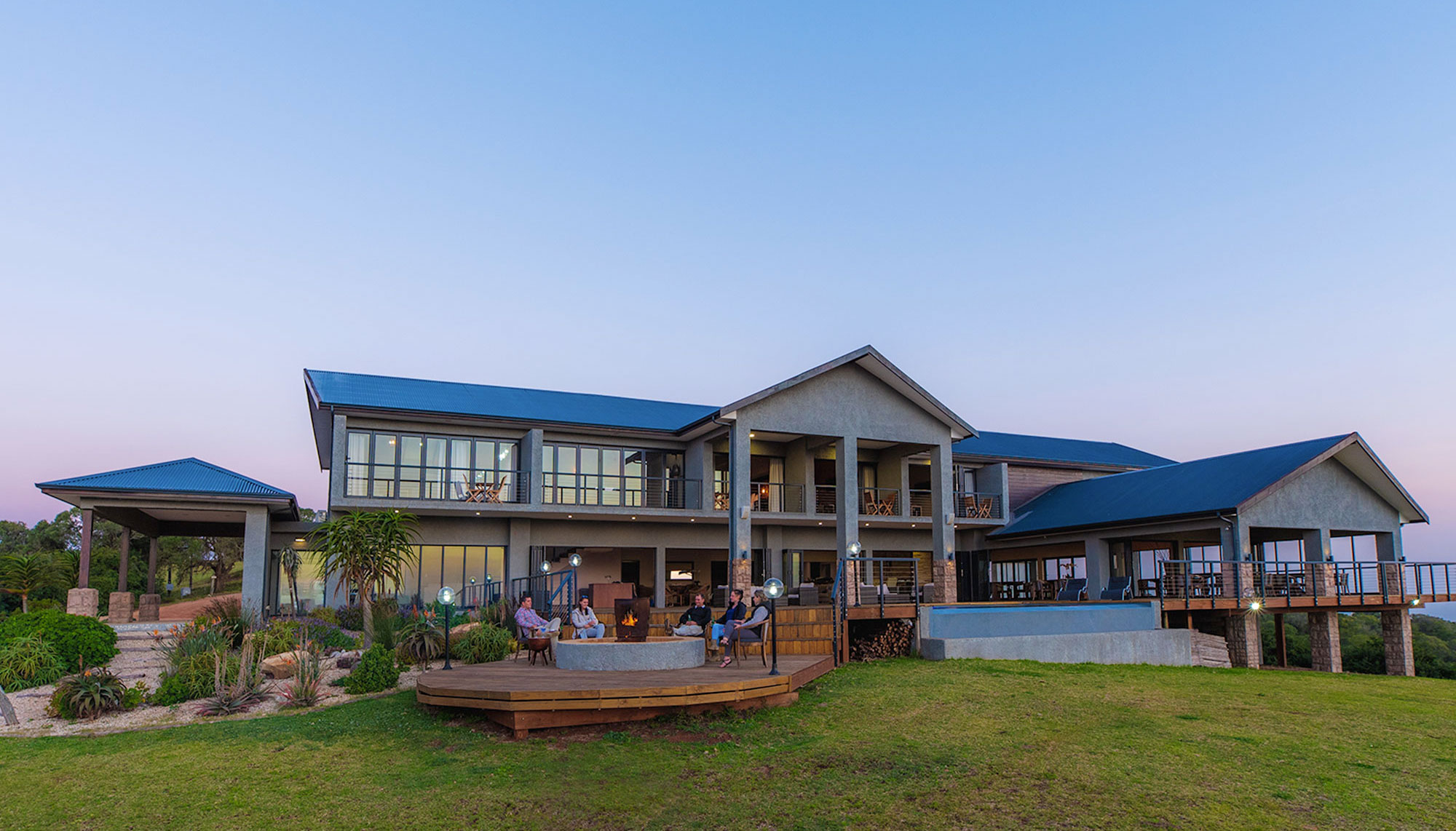 Elegant hilltop lodge with panoramic Eastern Cape views at golden hour